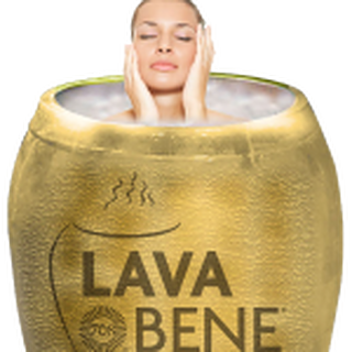 A guest relaxing in the gold Lava Bene steam pod